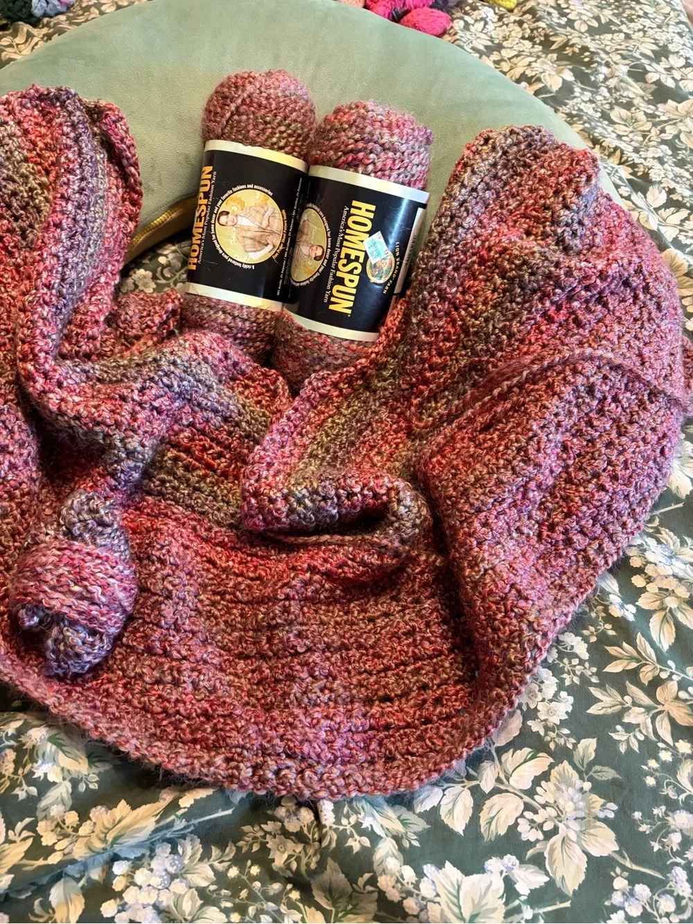 Homespun Variegated Pink Lavender Crochet Throw with Yarn bundle in Great Plains